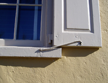 Shutter held open with forged hardware